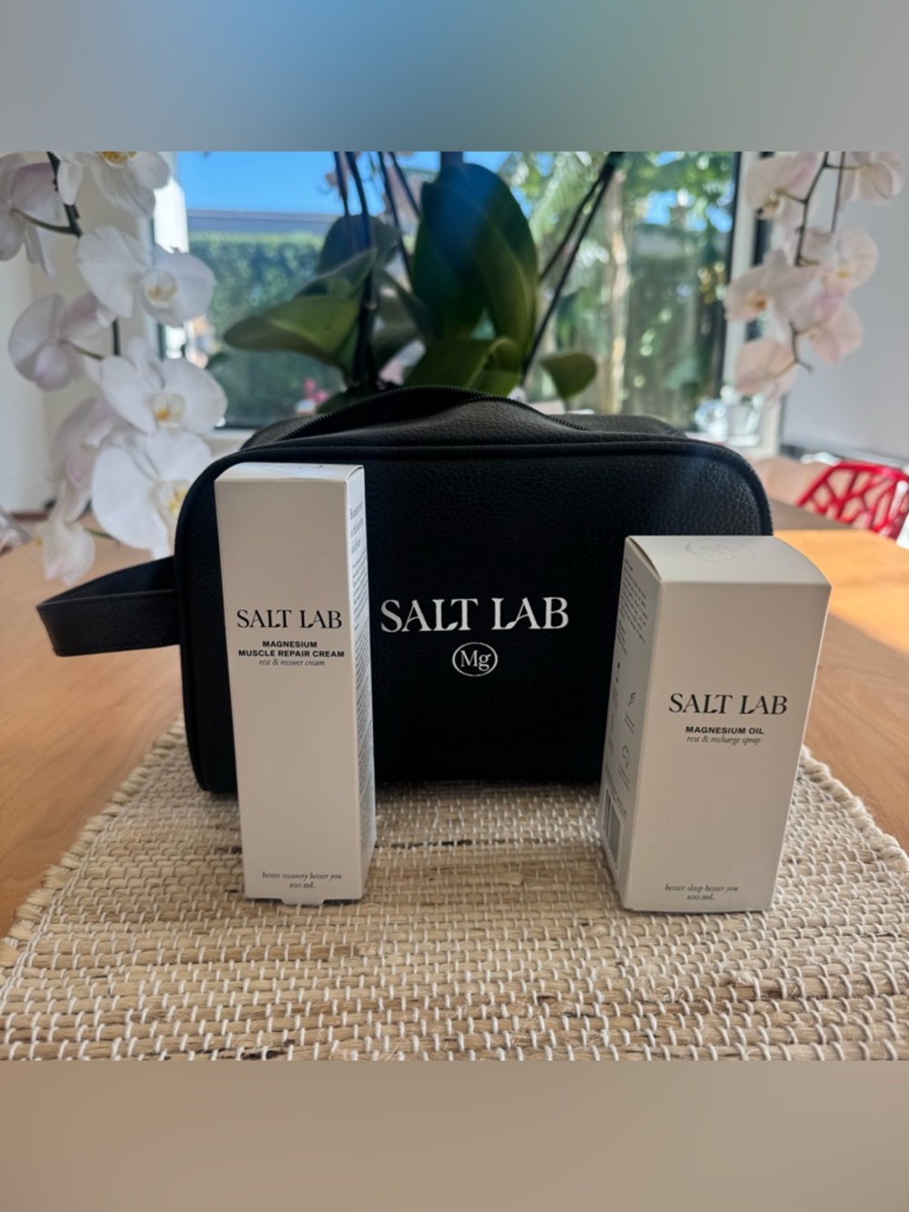 Salt Lab Magnesium Oil Spray and muscle repair cream with cosmetic bag